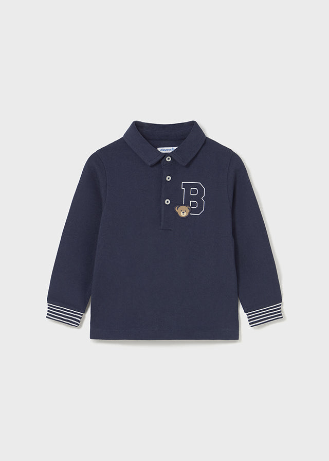 Polo à manches longues bleu avec broderies