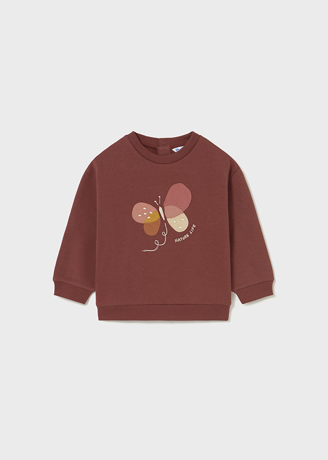 Sweat terracotta avec papillon brodé