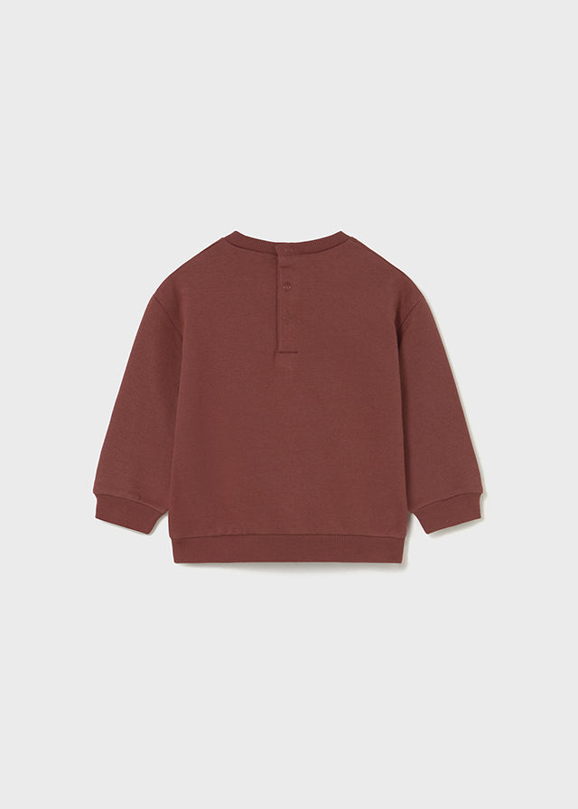 Sweat terracotta avec papillon brodé