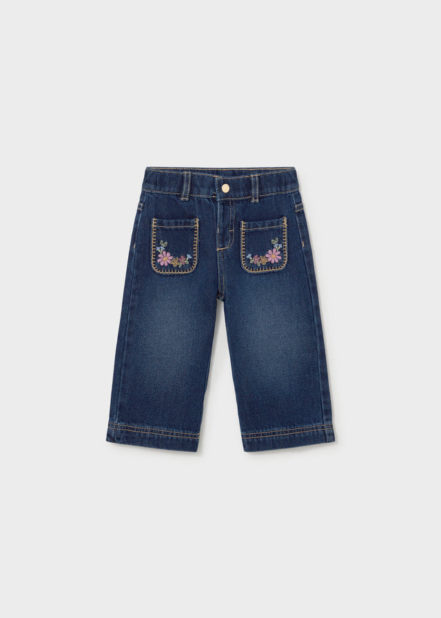 Pantalon en denim foncé avec poches brodées