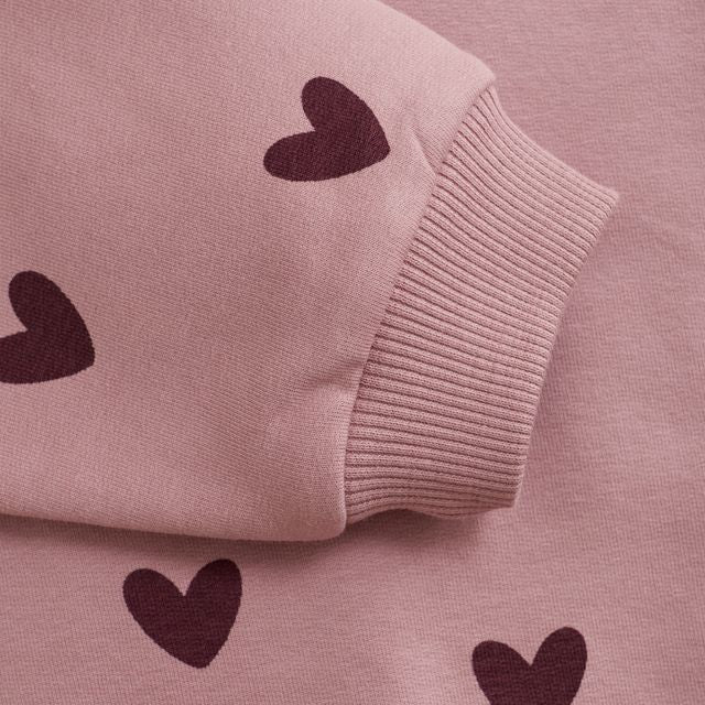 Sweat rose à imprimé de coeurs