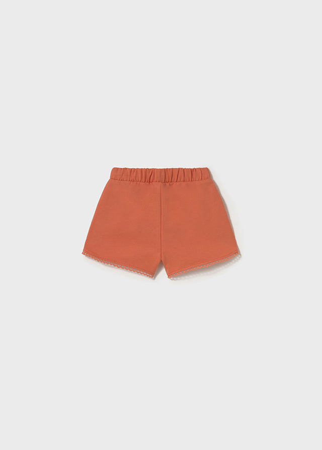 Short en molleton corail