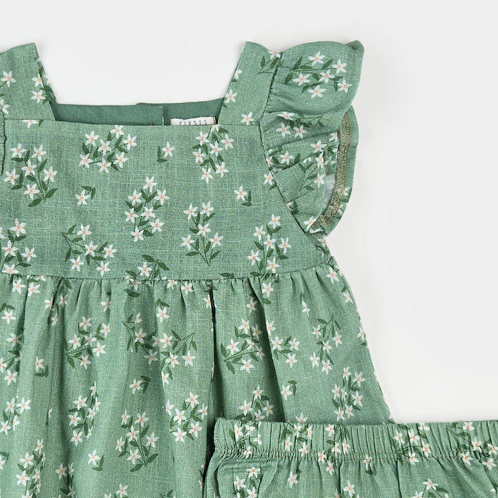 Robe verte à imprimé de fleurs exotiques