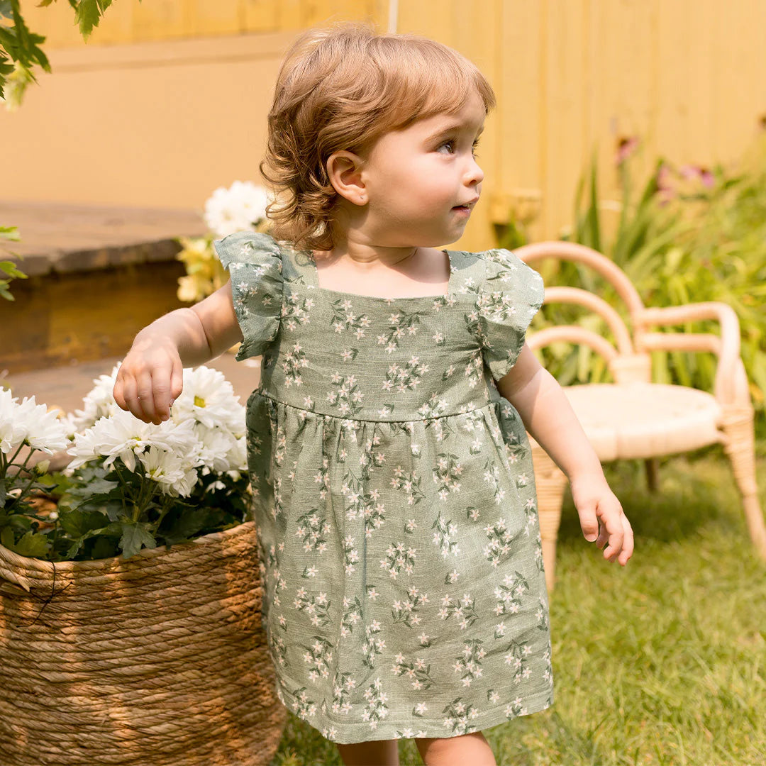 Robe verte à imprimé de fleurs exotiques