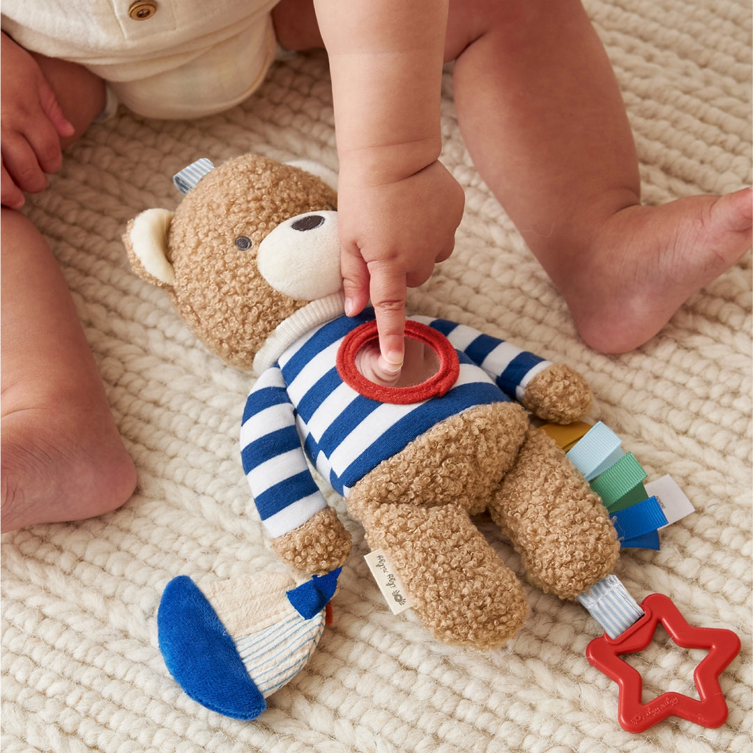 Jouet sensoriel Bitzy Traveler™ - Ourson marin