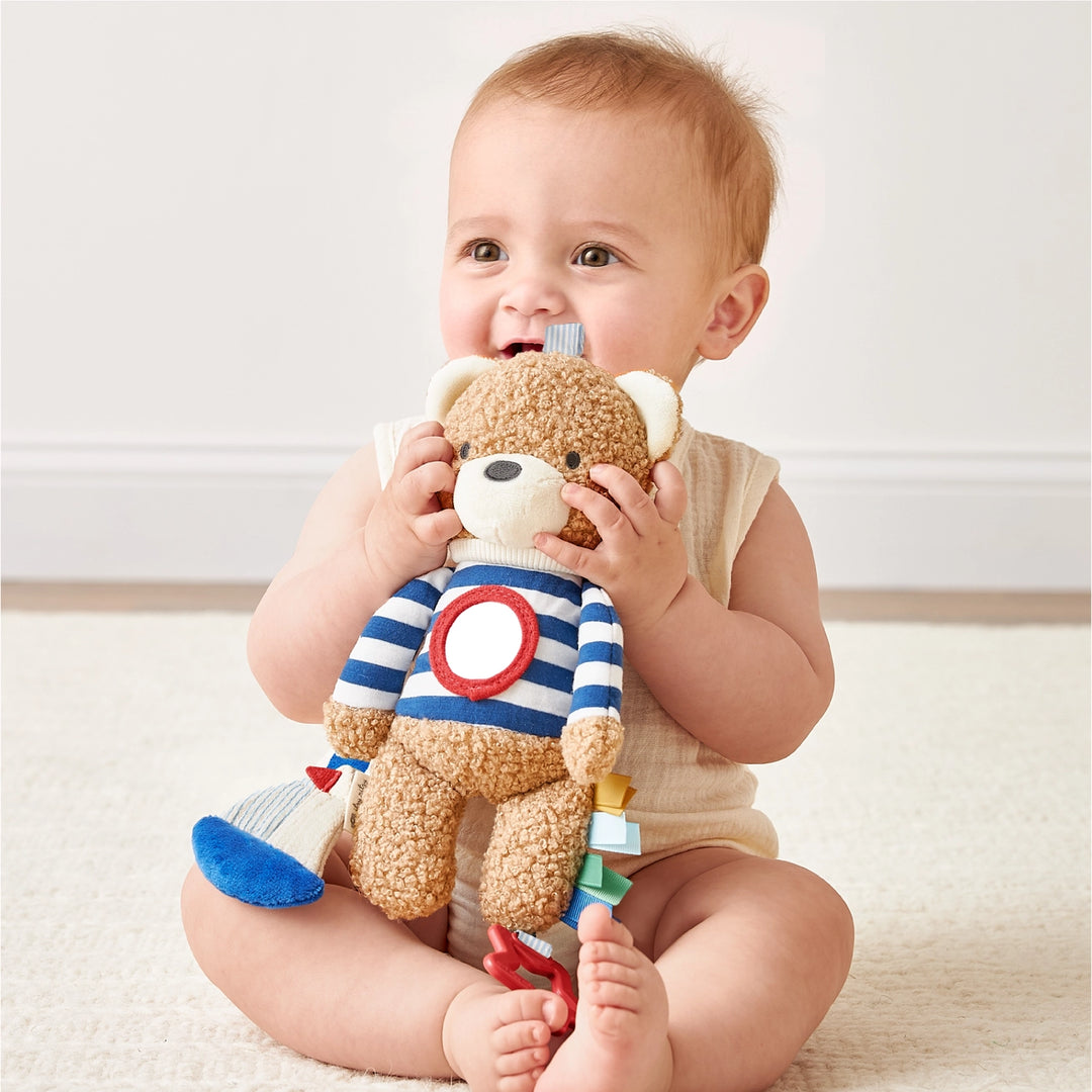Jouet sensoriel Bitzy Traveler™ - Ourson marin