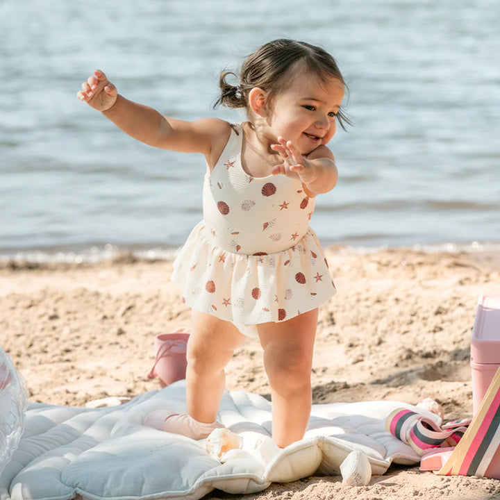 One-piece swimsuit with seashell print