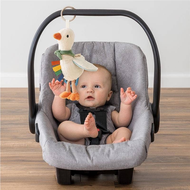 Jouet sensoriel Bitzy Traveler™ - Oie