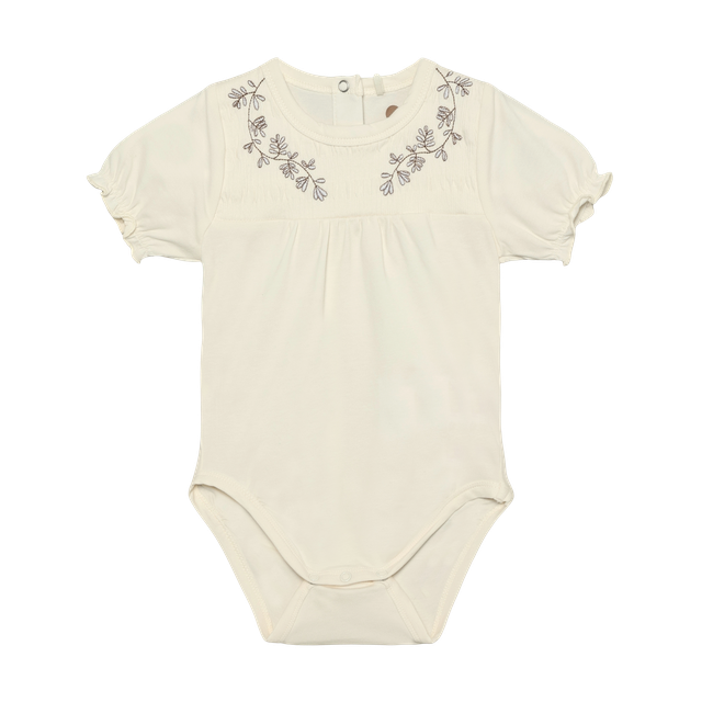 Embroidered onesie with smocked effect