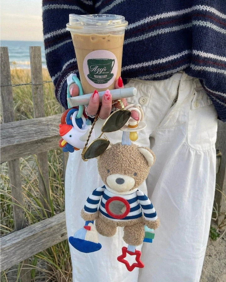 Jouet sensoriel Bitzy Traveler™ - Ourson marin