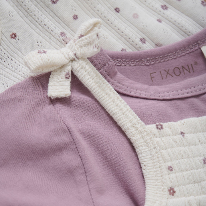 Ensemble salopette en pointelle fleurie avec cache-couche