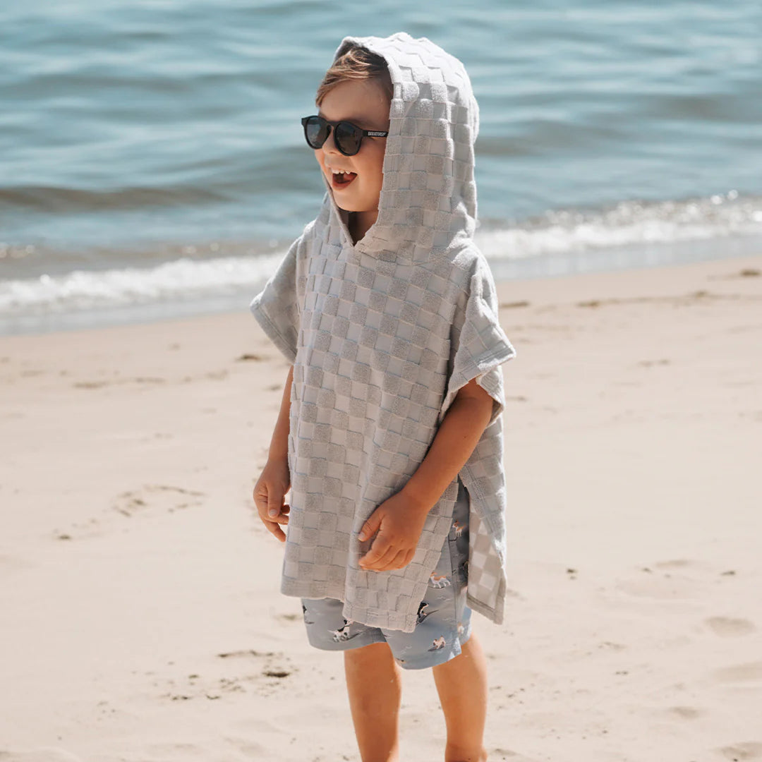 Blue checkered beach poncho