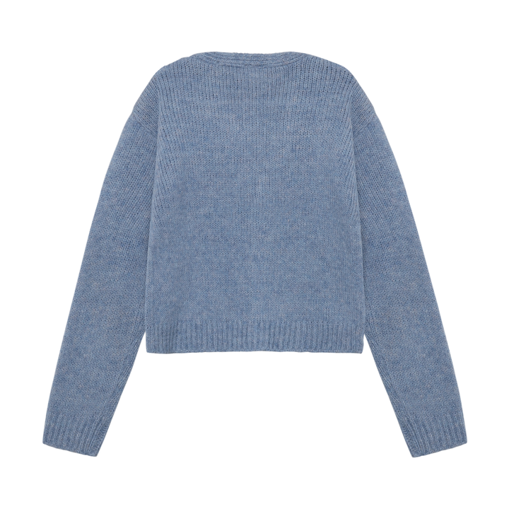 Cardigan en tricot bleu avec fleurs