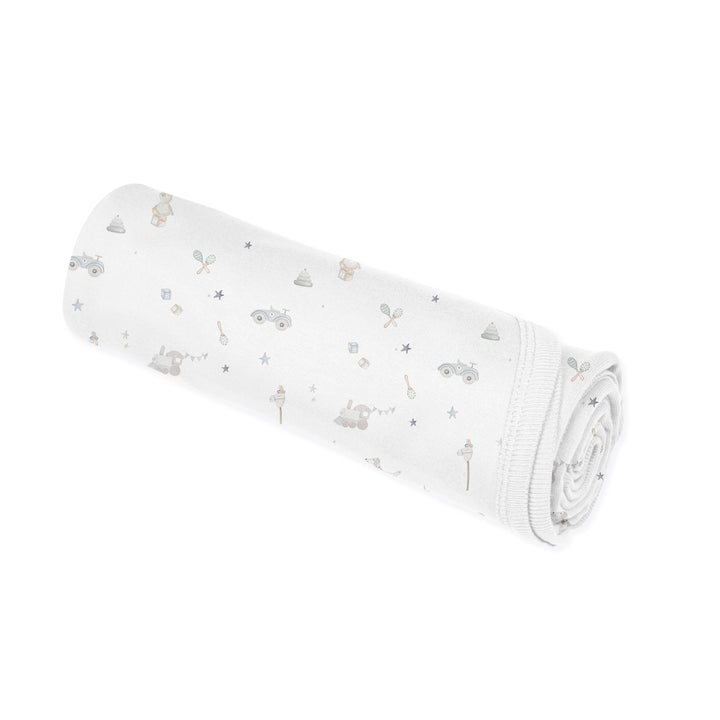 Couverture en modal - Jouets sur fond crème