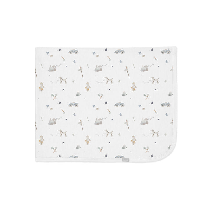 Couverture en modal - Jouets sur fond crème